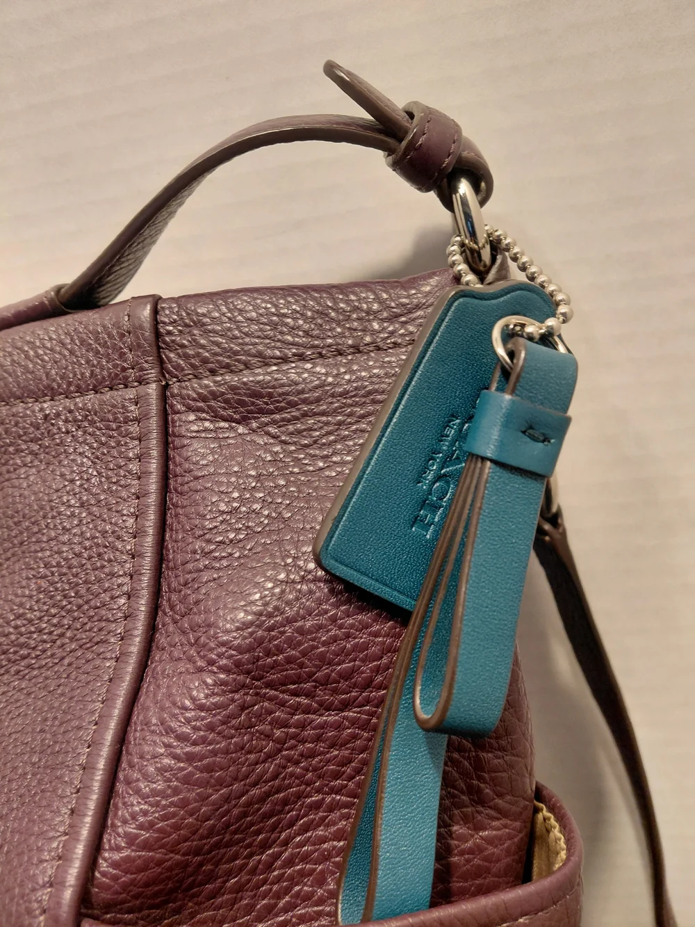 Coach Pebbled Leather Shoulder Bag/ Crossbody in Deep Plum.